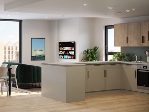 A modern kitchen with a large island and a view of the city.