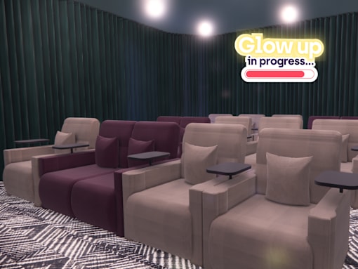 A row of beige chairs with a neon sign that says "Glow up in progress...".