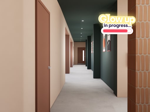 A hallway with a neon sign that says "Glow up in progress...".