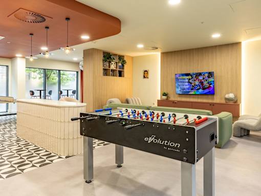 A foosball table with the word evolution written on it.