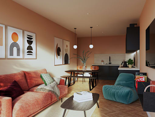 A living room with a red couch and a coffee table.