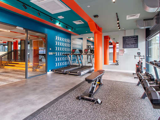On-site gym with bench and treadmills