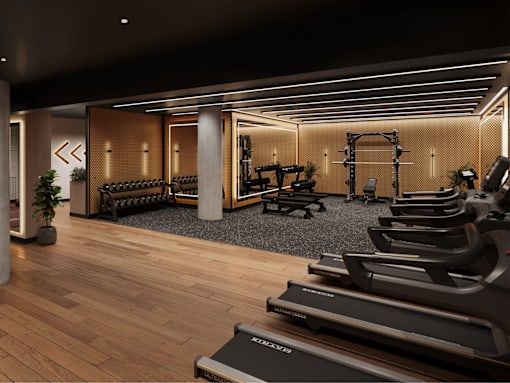 A gym with treadmills and other exercise equipment.