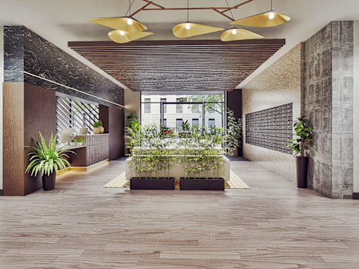 A modern hallway with wooden floors and a long table with plants on it.