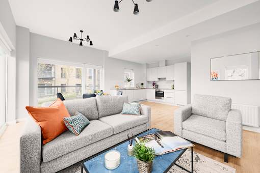 a living room with a couch and a coffee table