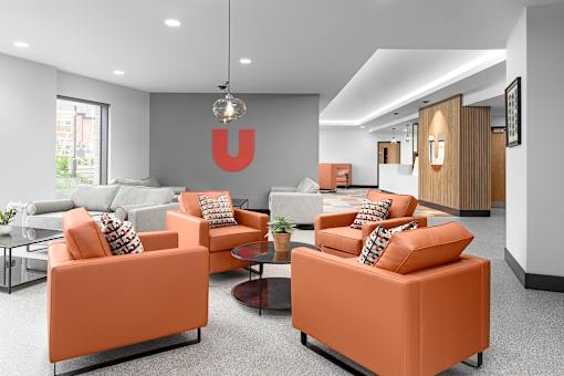 a living room with couches and a table