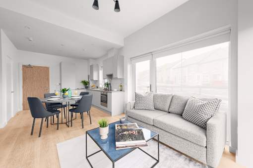 a living room with a couch and a table