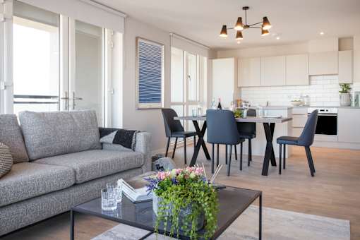 a living room with a couch and a table