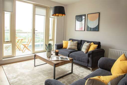 a living room with a couch and a coffee table