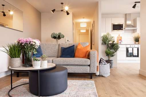 a living room with a couch and a coffee table