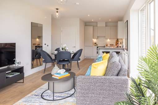 a living room with a couch and a table