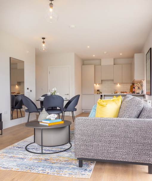 a living room with a couch and a table