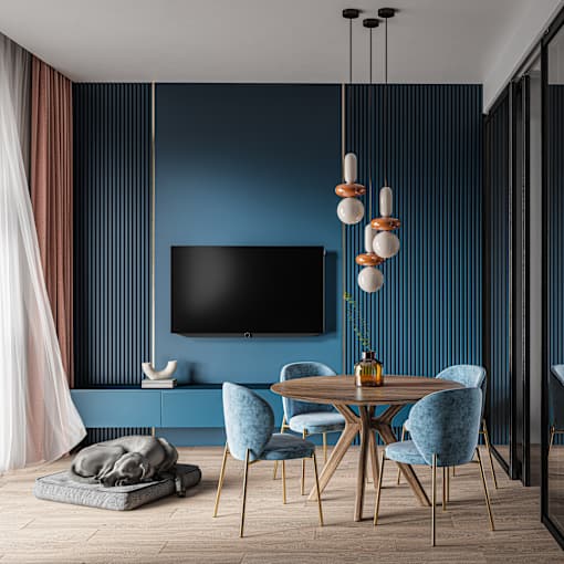 a dining room with blue walls and a table and chairs