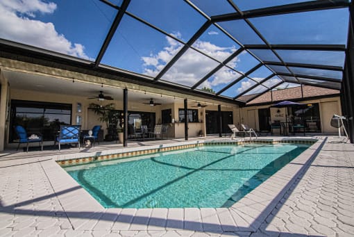 the pool is covered by a glass roof
