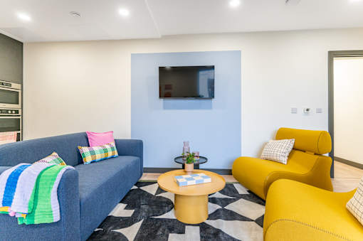 a living room with couches and a table