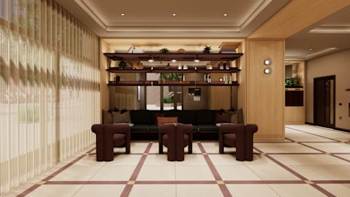 A well-lit, modern lounge area with a long sofa and a bar.