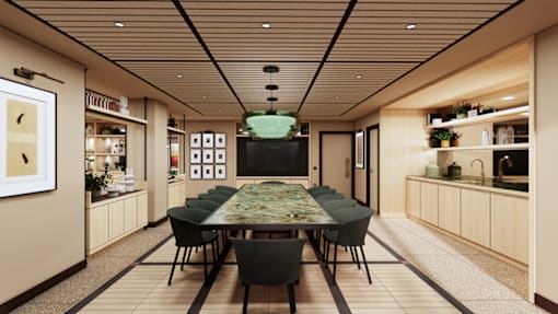 A dining room with a long table and chairs.