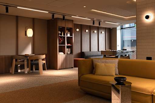 A modern living room with a yellow sofa and a wooden table.