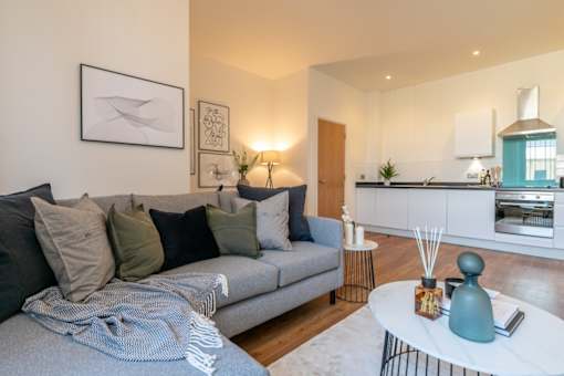 a living room with a couch and a coffee table at The Keel Apartments, Liverpool