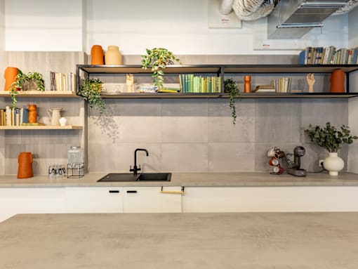 a kitchen with white cabinets and shelves and a sink