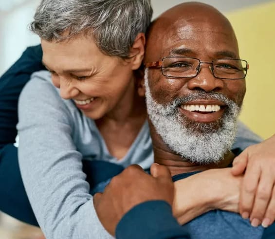 a man and a woman hugging