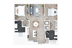 A top-down view of a living room with a couch, coffee table, and kitchen area.