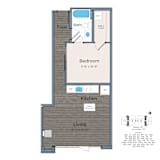 A floor plan of a small apartment with a bedroom, kitchen, and living room.