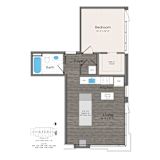 A floor plan of a small apartment with a bedroom, living room, and kitchen.