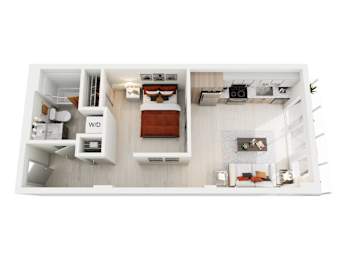 A white model of a small apartment with a bed, desk, and a small kitchenette.