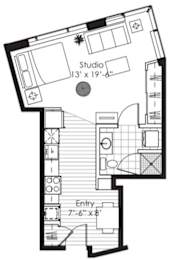 A floor plan of a studio apartment with a studio space, entry, and stairs.