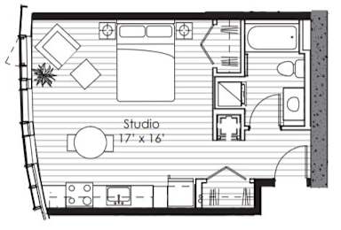 A floor plan of a studio apartment with a living room, kitchen, and bathroom.