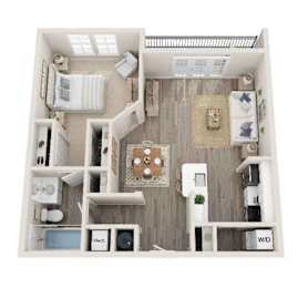 A dollhouse living room with furniture and a kitchen area.