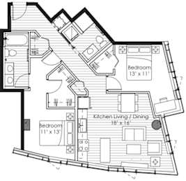 A black and white image of a house floor plan with two bedrooms and a kitchen living/dining area.