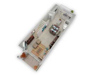 A top-down view of a living room with a couch, coffee table, and a staircase leading to another room.