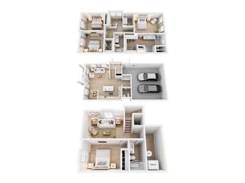 Three floor plans of a house with a garage on the bottom floor.