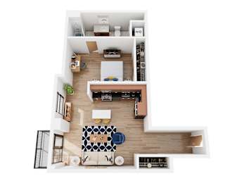 A top down view of a living room with a couch, coffee table, and kitchen area.