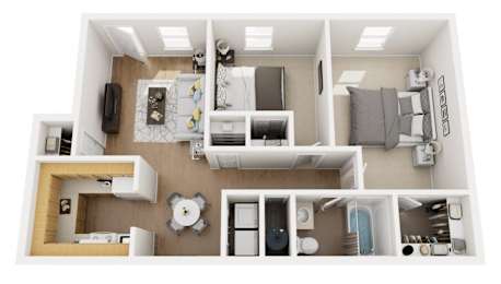 A top-down view of a small apartment with a kitchen, living room, and bedroom.