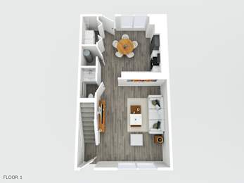 A top down view of a small apartment with a living room, kitchen, and stairs leading to another floor.