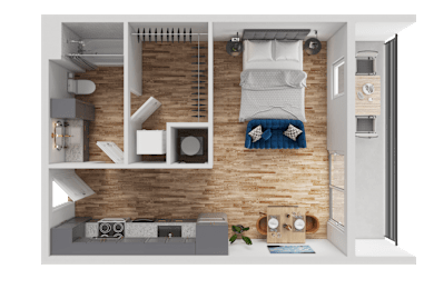A small room with a bed, a table, and a chair.