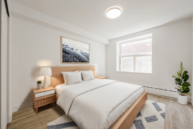 A bedroom with a bed, nightstand, and a painting on the wall. at 111 Cosburn, East York, ON