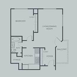 A floor plan of a home with a bedroom, living/dining room, kitchen, and foyer.