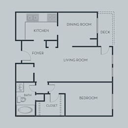 A floor plan of an apartment with a bedroom, living/dining room, kitchen, and bathroom.
