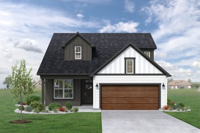 a home with a brown and white exterior and a brown garage door