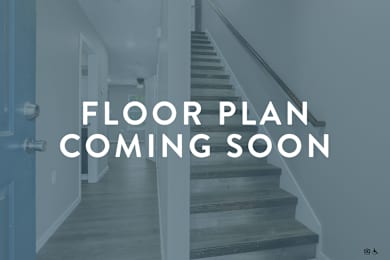 A staircase in a house with a sign that says "Floor Plan Coming Soon".