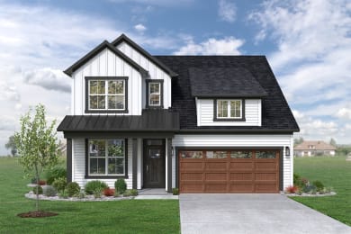 a home with white siding and a black roof and a brown garage door