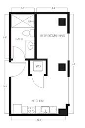 A floor plan of a small apartment with a bedroom, a kitchen, and a bathroom.
