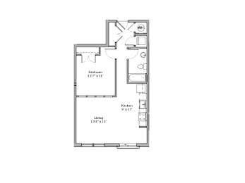 A floor plan of a small apartment with a kitchen, living room, and bedroom.