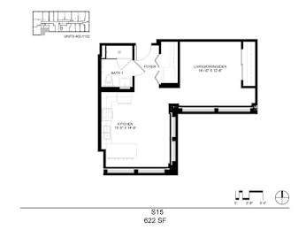A floor plan of a living space with a kitchen and two bathrooms.