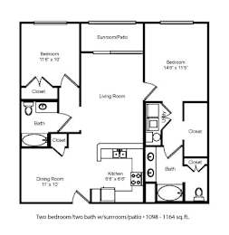 A black and white image of a two bedroom, two bath house plan.