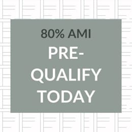 A sign that says 80% AMI Pre-Qualify Today.